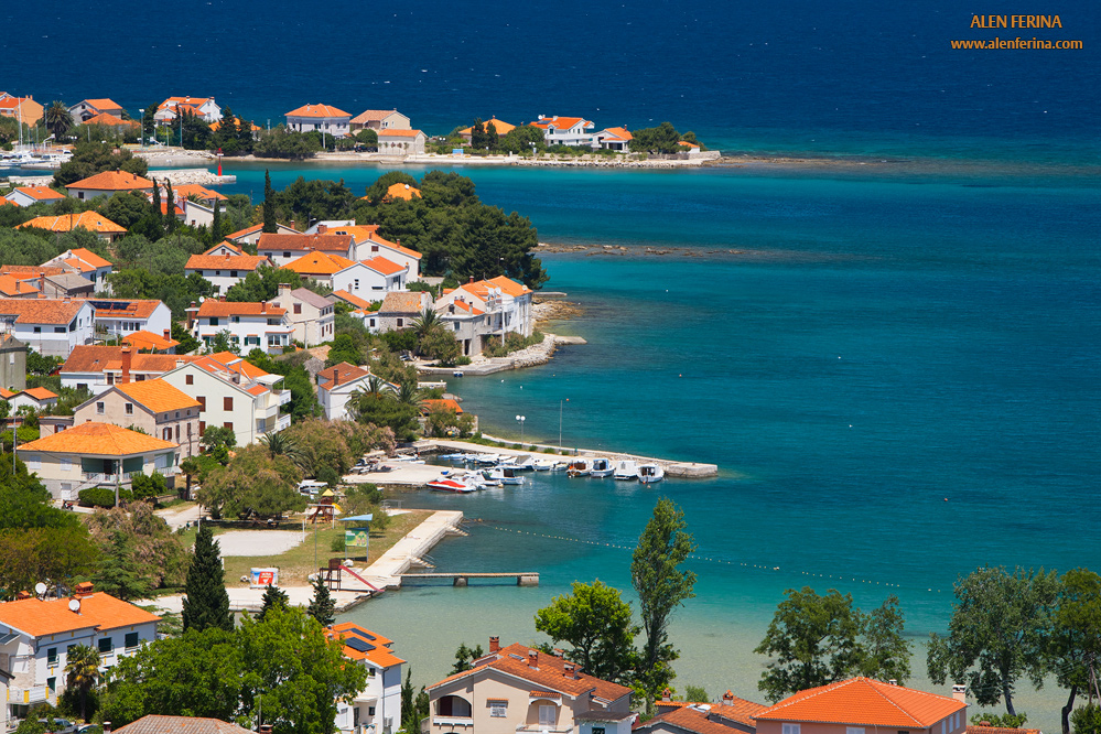 Panoramic view of crystal clear sea and coast of place Poljana and Preko.