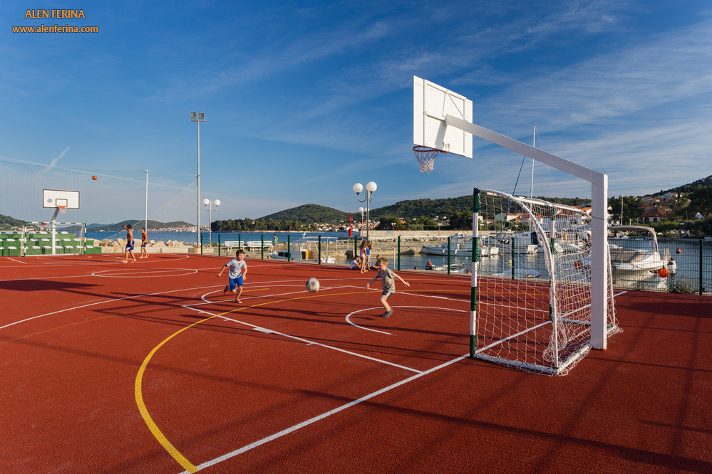 Football and basketball field is just a minute away from our apartments.