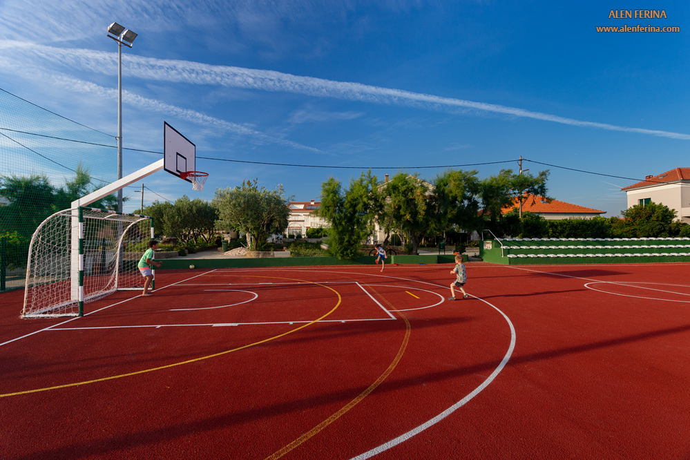 Football and basketball field is just a minute away from our apartments.