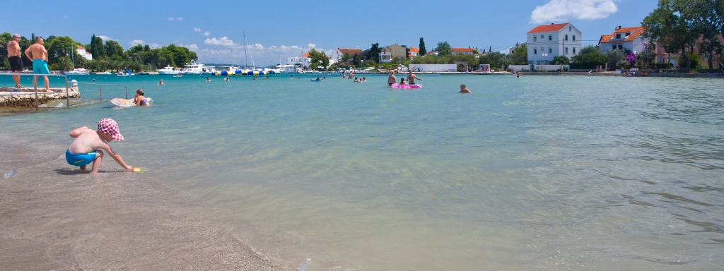 Famous beach Jaz in town Preko on island Ugljan, Dalmatia, Croat