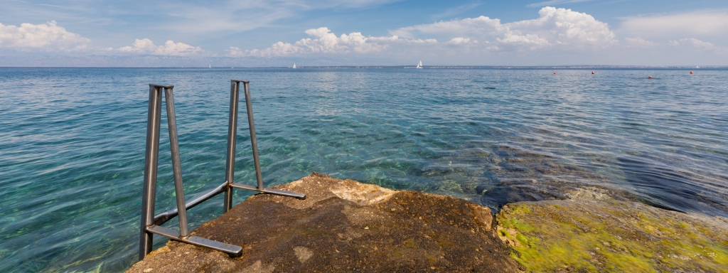 Entrance to the sea at cove Susica in place Ugljan, island Uglja